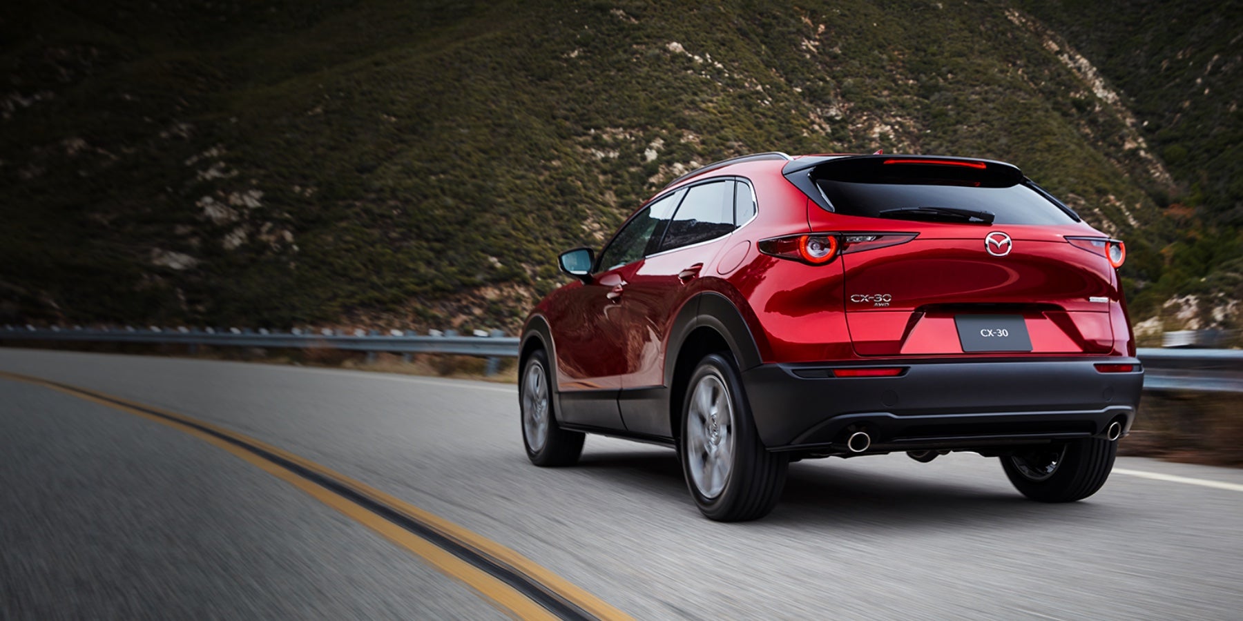 Red 2020 Mazda CX-30 Driving on the road | Cook Mazda in Aberdeen, MD