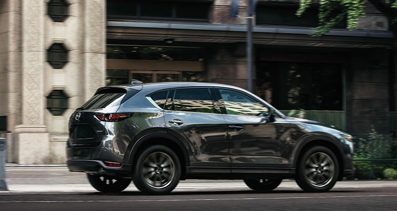 Grey 2020 Mazda CX-5 Driving on the road | Cook Mazda in Aberdeen, MD